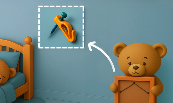 Teddy bear holding a picture frame