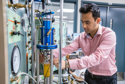 Ribu Dhakal working in the Geolab at the University of Canterbury.