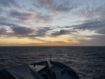 Sunset from a boat in the ocean.