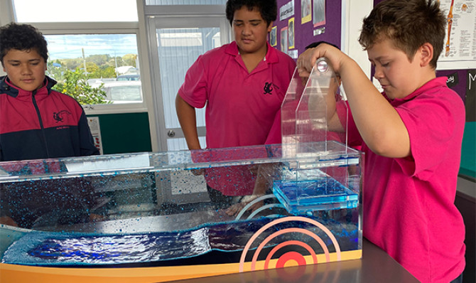 School kids exploring the East Coast Lab tsunami exhibit