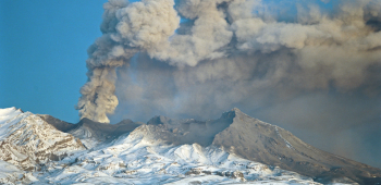 Volcano emitting ash 